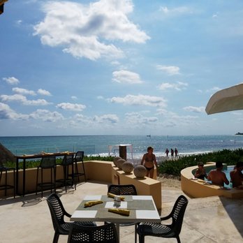 Dreams Jade Resort & Spa - Table by the preferred pool - Hotels Near Me - Puerto Morelos, ROO