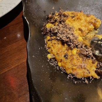 Junoon - Mushroom and truffle khichdi. I couldn't wait to eat, hence the picture of an eaten plate! - Indian Near Me - New York, New York
