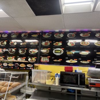 Playa Cafe - Just part of the menu on this wall - Cuban Near Me - Miami Beach, Florida