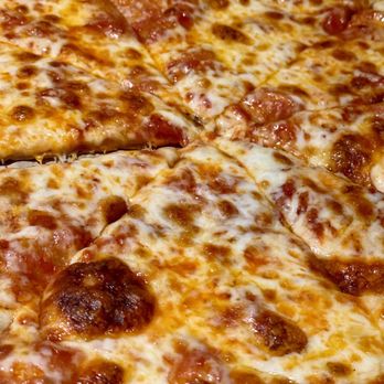 Character's Sports Bar - Cheese Pizza. Made with hand rolled dough and baked in their brick oven. - Sports Bars Near Me - Denver, Colorado