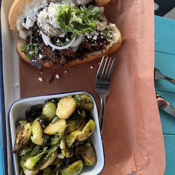 Irene’s BBQ - Wagyu beef barbacoa sandwich, with macha roasted brussels - Barbeque Near Me - Columbia, Missouri Irene’s BBQ - Wagyu beef barbacoa sandwich, with macha roasted brussels - Barbeque Near Me - Columbia, Missouri