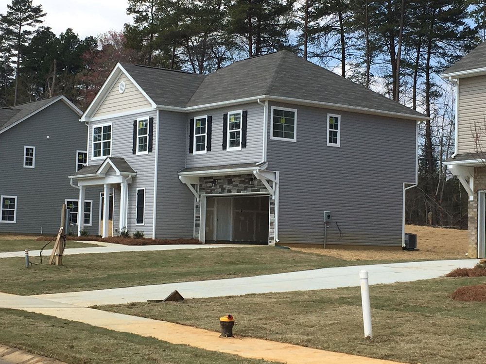 Slide of The Roofing Guy