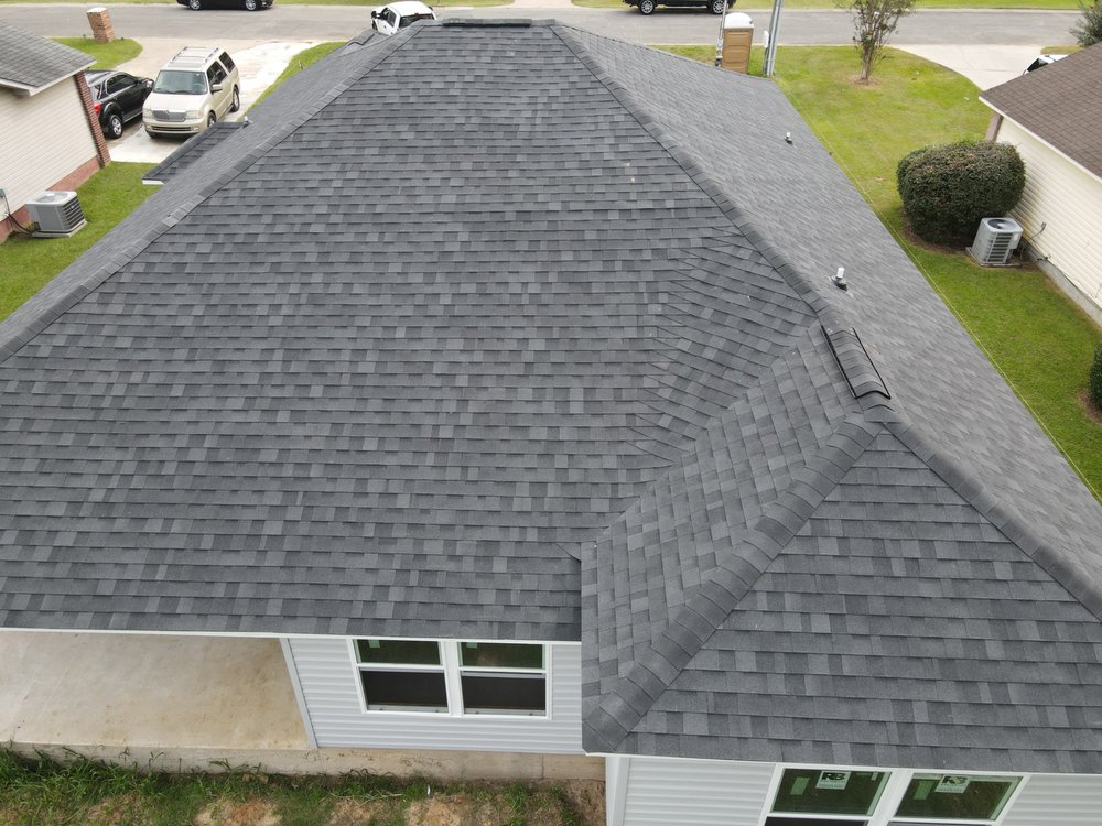 Slide of Helen’s Vinyl Siding and Roofing