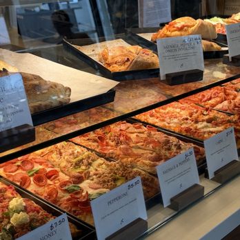 Baldinucci Pizza Romana - Glass display - Pizza Near Me - Austin, Texas Baldinucci Pizza Romana - Glass display - Pizza Near Me - Austin, Texas