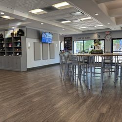 The Table - Main space when you walk in. Featuring one of the many screens and ads I mentioned in my review.