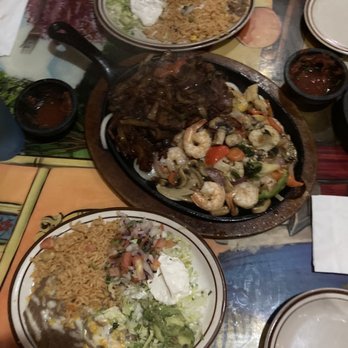 Los Corrales - Fajita Platter for 2. Steak and shrimp with rice and beans - Mexican Near Me - Show Low, Arizona Los Corrales - Fajita Platter for 2. Steak and shrimp with rice and beans - Mexican Near Me - Show Low, Arizona