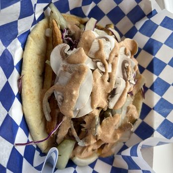 Alley Gyros - Lamb gyro with house pickles, cabbage and spicy tzatziki- messy and delicious! - Greek Near Me - Corvallis, Oregon Alley Gyros - Lamb gyro with house pickles, cabbage and spicy tzatziki- messy and delicious! - Greek Near Me - Corvallis, Oregon