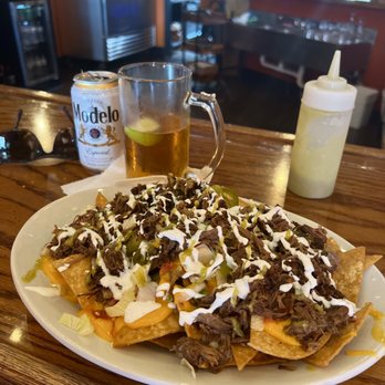 Los Dos Amigos - Beef Birria nachos with Modelo. - Mexican Near Me - Earlville, Illinois