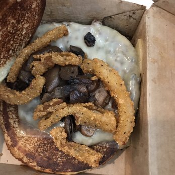 McDonald's - a burger with onion rings and cheese - Fast Food Near Me - Wright, Florida