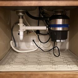 Gator Rooter and Plumbing - Kitchen wall under sink was patched up nicely and cleaned after new pipe replaced.