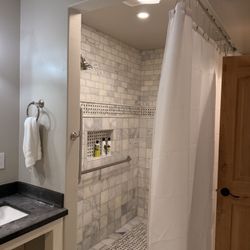 Calderwood Inn - Shower curtain does not close and water pressure is so so low. Horrible