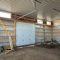 Next Day Garage Doors - Our customer built a new shop and we installed four new doors.
