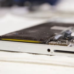 The IT Sage - Swollen battery. Left unattended long enough, it can cause damage to other Mac laptop components like the trackpad.