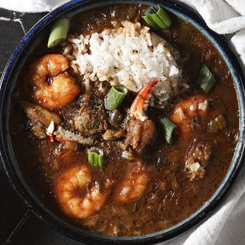 Cajun Country Cafe - This is what they served a few years ago during Covid. Nice red color, vegetable, and lots of seafood including fish. - Cajun/Creole Near Me - Oxnard, California
