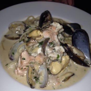 The Monkey Cat - A special of mixed seafood over linguini in a coconut thai sauce with a touch of heat....so delish - New American Near Me - Auburn, California The Monkey Cat - A special of mixed seafood over linguini in a coconut thai sauce with a touch of heat....so delish - New American Near Me - Auburn, California