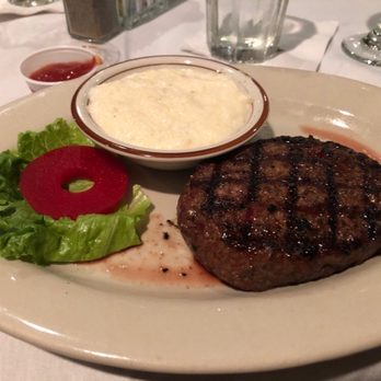 Captain's Quarters - Ground beef steak with grits. Cooked perfectly...Yum! - New American Near Me - Santee, South Carolina Captain's Quarters - Ground beef steak with grits. Cooked perfectly...Yum! - New American Near Me - Santee, South Carolina