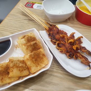 Mom's Pan-Fried Buns - Deep fried rice cakes with brown sugar syrup and squid skewers - Chinese Near Me - Toronto, Ontario