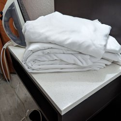 Quality Inn & Suites Airport - Sheets left for us. I guess we are expected to make our own bed?
