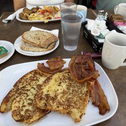 My french toast and bacon and a view of my friend's omlette
