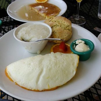 Sage Biscuit Cafe - Three cheese egg white omelette,  grits,  sage biscuit and a pancake. - Breakfast & Brunch Near Me - Bradenton, Florida