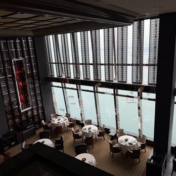 Tin Lung Heen - A partial view of the spectacular dining room.  That's our corner window table there! - Cantonese Near Me - Kowloon, HK
