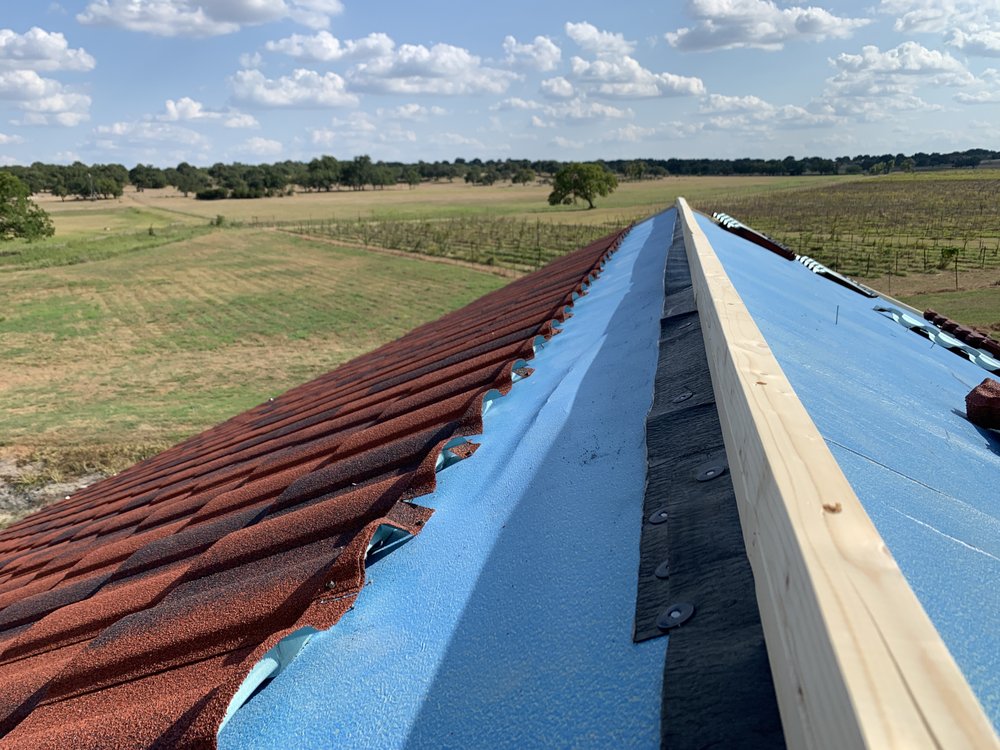 Slide of Top Notch Roofing