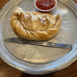 American Pie Pizza - Supposed large calzone. Would hate to see the small. Guess small would be for a 18 month old