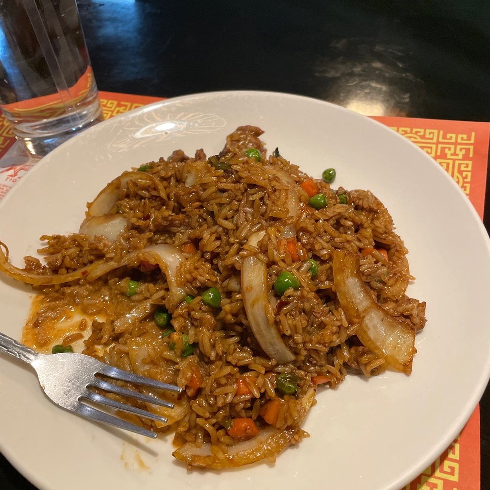 Beef fried rice with medium spices, ordered a side of red coconut curry but this is good without it. Beef fried rice with medium spices, ordered a side of red coconut curry but this is good without it.