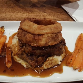 Craft Street Kitchen - Not your mama's meatloaf: garlic mashed potatoes, honey glazed carrots, meatloaf, and onion rings! - New American Near Me - Trinity, Florida Craft Street Kitchen - Not your mama's meatloaf: garlic mashed potatoes, honey glazed carrots, meatloaf, and onion rings! - New American Near Me - Trinity, Florida