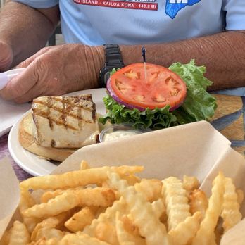 Voyagers - Paddler's Fish Sandwich with a side of crispy fries! - Seafood Near Me - Kailua-Kona, Hawaii Voyagers - Paddler's Fish Sandwich with a side of crispy fries! - Seafood Near Me - Kailua-Kona, Hawaii