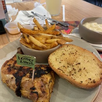 Nando's Peri-Peri - 1/4 chicken with fries and garlic bread - Chicken Shop Near Me - Addison, Texas