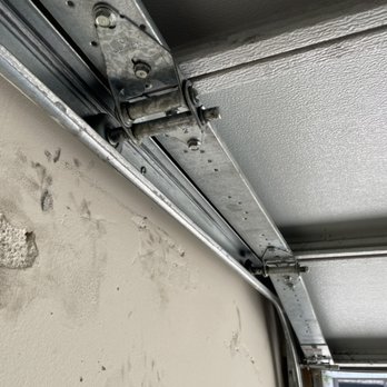 Garage Door Basics - ROLLER PLACED BACK ON TRACK WITH A BALANCED DOOR - Garage Door Services Near Me - Glendale, California