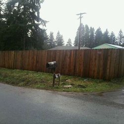 J & A fencing - 6' dog ear wood with wood posts.
