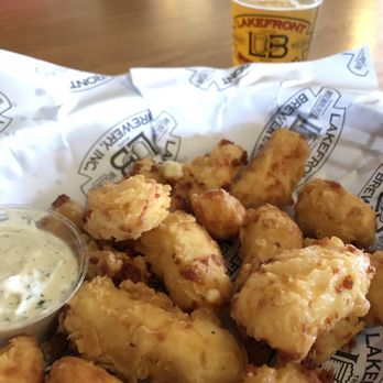 Lakefront Brewery - Fried cheese curds and Hazy Rabbit IPA 6oz pour - Breweries Near Me - Milwaukee, Wisconsin Lakefront Brewery - Fried cheese curds and Hazy Rabbit IPA 6oz pour - Breweries Near Me - Milwaukee, Wisconsin