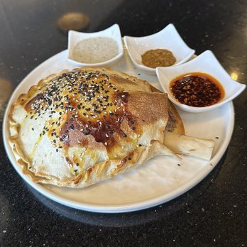 Kusan Bazaar | Silk Road Grill & Noodles 龟兹集市 - Wellington-Style Roasted Lamb Shank - Halal Near Me - Milpitas, California
