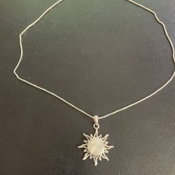 Two's Company Of Avalon - Mother of Pearl sun necklace.