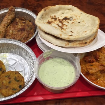 Haandi - Naan, chicken chapli kabab, butter chicken, seekh kabab, raita - Indian Near Me - New York, New York Haandi - Naan, chicken chapli kabab, butter chicken, seekh kabab, raita - Indian Near Me - New York, New York