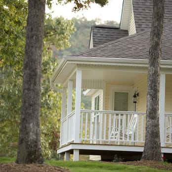 Stonehill Cottages - View of the porch of the Farmhouse Cottage rental - Vacation Rentals Near Me - Mena, Arkansas Stonehill Cottages - View of the porch of the Farmhouse Cottage rental - Vacation Rentals Near Me - Mena, Arkansas