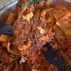 Oli's Fashion Cuisine - The bottom of my burnt, bitter and bad Chicken Parm
