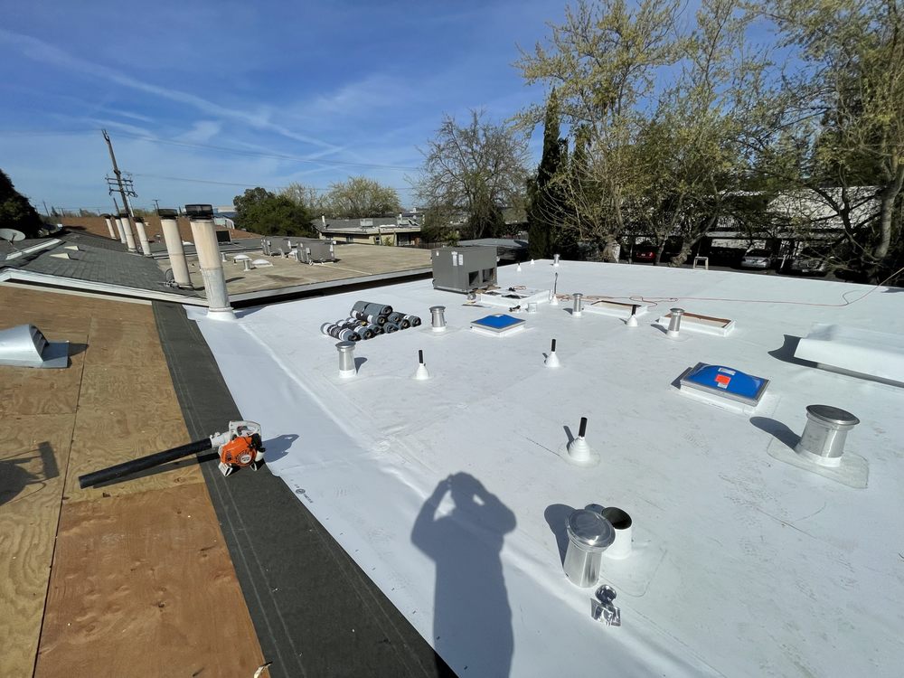 Slide of Emerald Roofing