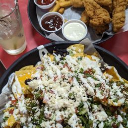 Nachos and chicken tenders, great portions! Nachos and chicken tenders, great portions!