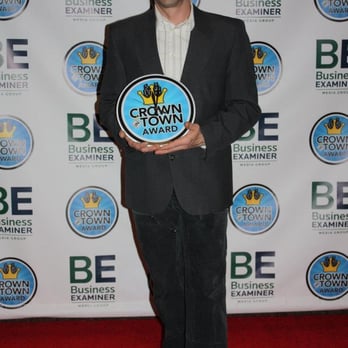 Terrapin Tile - a man in a suit holding a plaque - General Contractors Near Me - Vashon Island, Washington Terrapin Tile - a man in a suit holding a plaque - General Contractors Near Me - Vashon Island, Washington