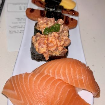 Genki Sushi - Salmon Nigiri... big slice hanging off da plate! - Sushi Bars Near Me - Waipahu, Hawaii Genki Sushi - Salmon Nigiri... big slice hanging off da plate! - Sushi Bars Near Me - Waipahu, Hawaii