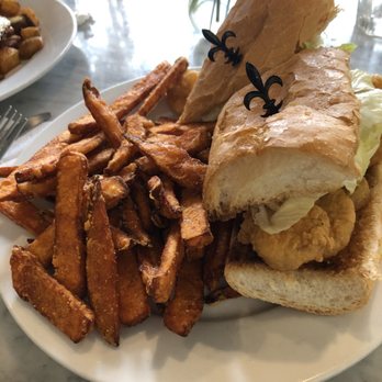 Stanley - Fried shrimp poboy with sweet potato fries! Perfectly cooked! - Breakfast & Brunch Near Me - New Orleans, Louisiana Stanley - Fried shrimp poboy with sweet potato fries! Perfectly cooked! - Breakfast & Brunch Near Me - New Orleans, Louisiana