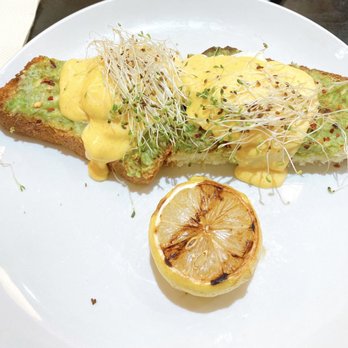 Friedman's - Avocado toast with Hollandaise sauce - Breakfast & Brunch Near Me - New York, New York Friedman's - Avocado toast with Hollandaise sauce - Breakfast & Brunch Near Me - New York, New York