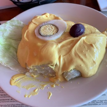 Mochica Restaurant - Papa huancaina, boiled potatoes with Peruvian cheese sauce - Peruvian Near Me - Norwalk, Connecticut Mochica Restaurant - Papa huancaina, boiled potatoes with Peruvian cheese sauce - Peruvian Near Me - Norwalk, Connecticut