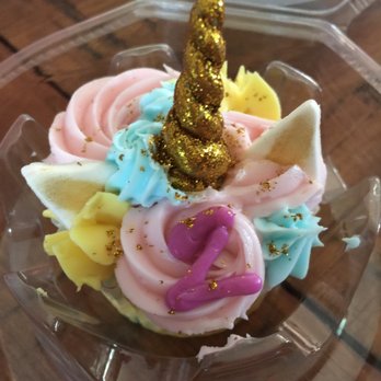 The Makery Cake - Single birthday cupcake, matching the cake we ordered-definitely did not skimp on size or frosting! - Bakeries Near Me - Centennial, Colorado