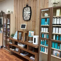 Sculpted salon - Wide variety of products such as Beekman , Milbon, Keratin Complex, and Moroccan Oil on display to boost branding to customers.