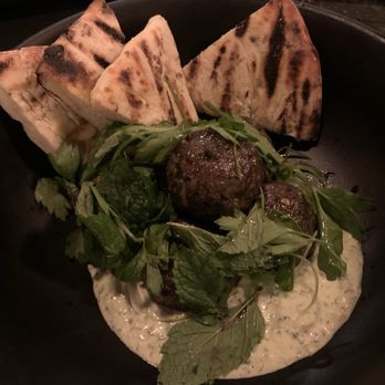 Mojave Gold - Lamb meatballs served with chimichurri yogurt, herbs, and housemade pita. - Music Venues Near Me - Yucca Valley, California Mojave Gold - Lamb meatballs served with chimichurri yogurt, herbs, and housemade pita. - Music Venues Near Me - Yucca Valley, California
