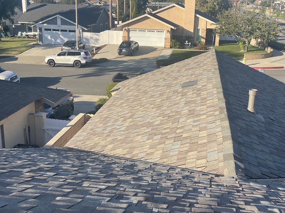 Slide of Rudy’s roofing